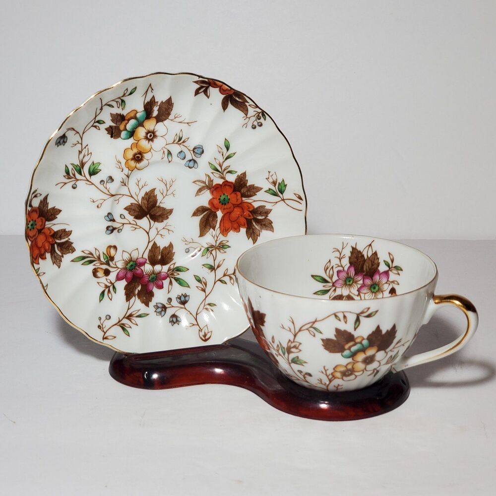 Norcrest Teacup and Saucer Orange Yellow Pink Flowers